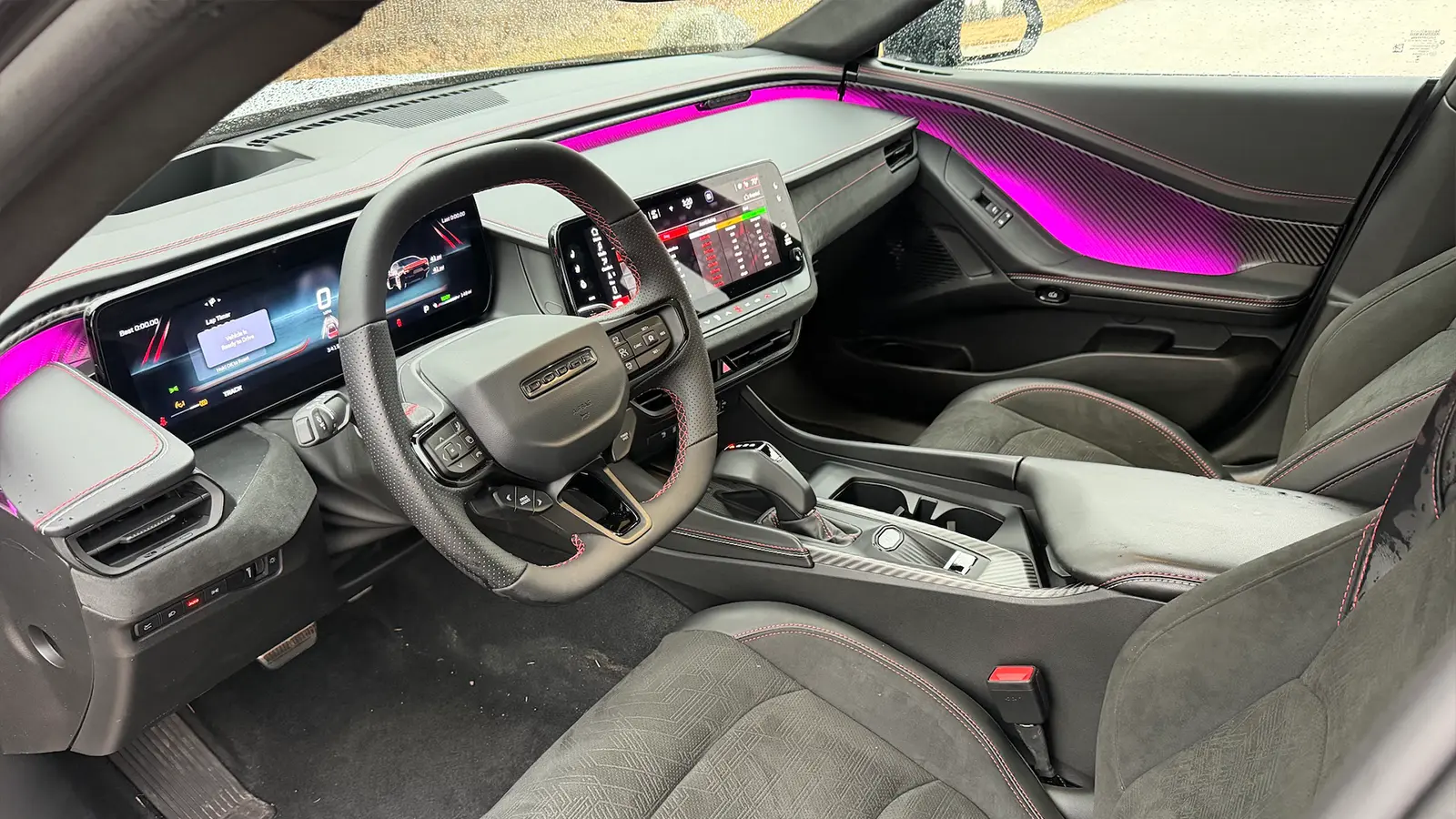 A silver 2026 Dodge Charger Daytona EV driver side view