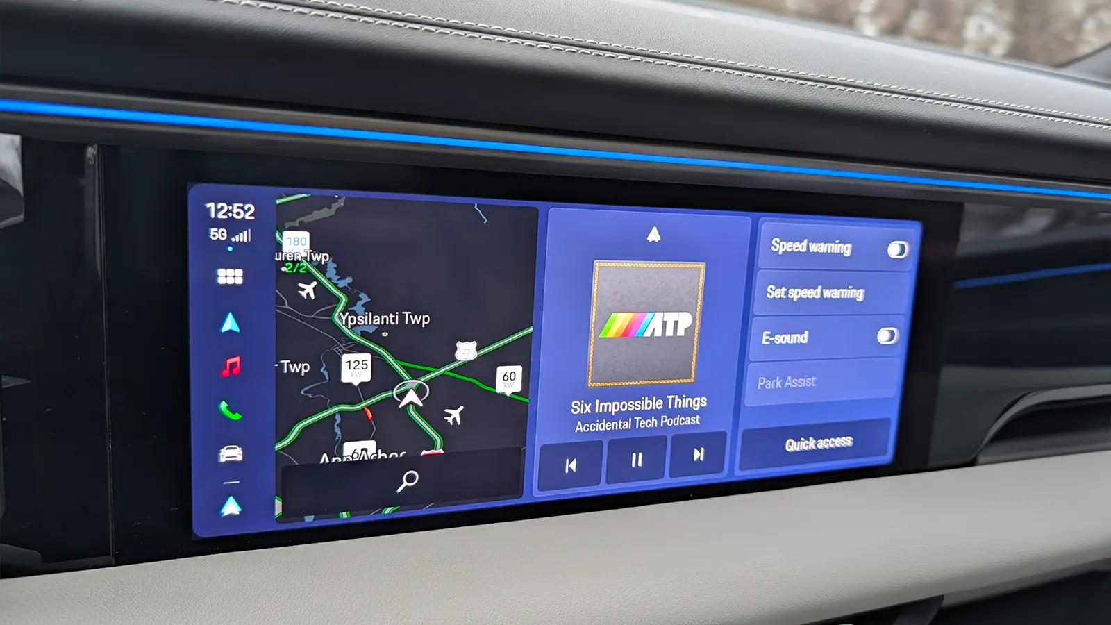 A light blue 2025 Porsche Macan 4S HUD navigation view