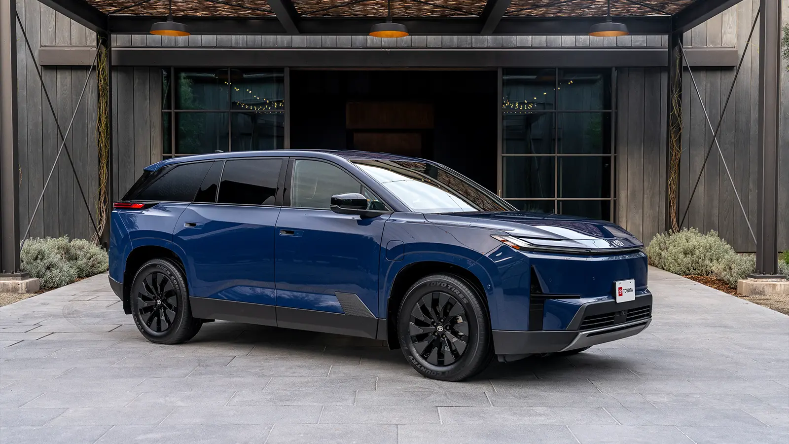 A 2027 Toyota Highlander EV side view