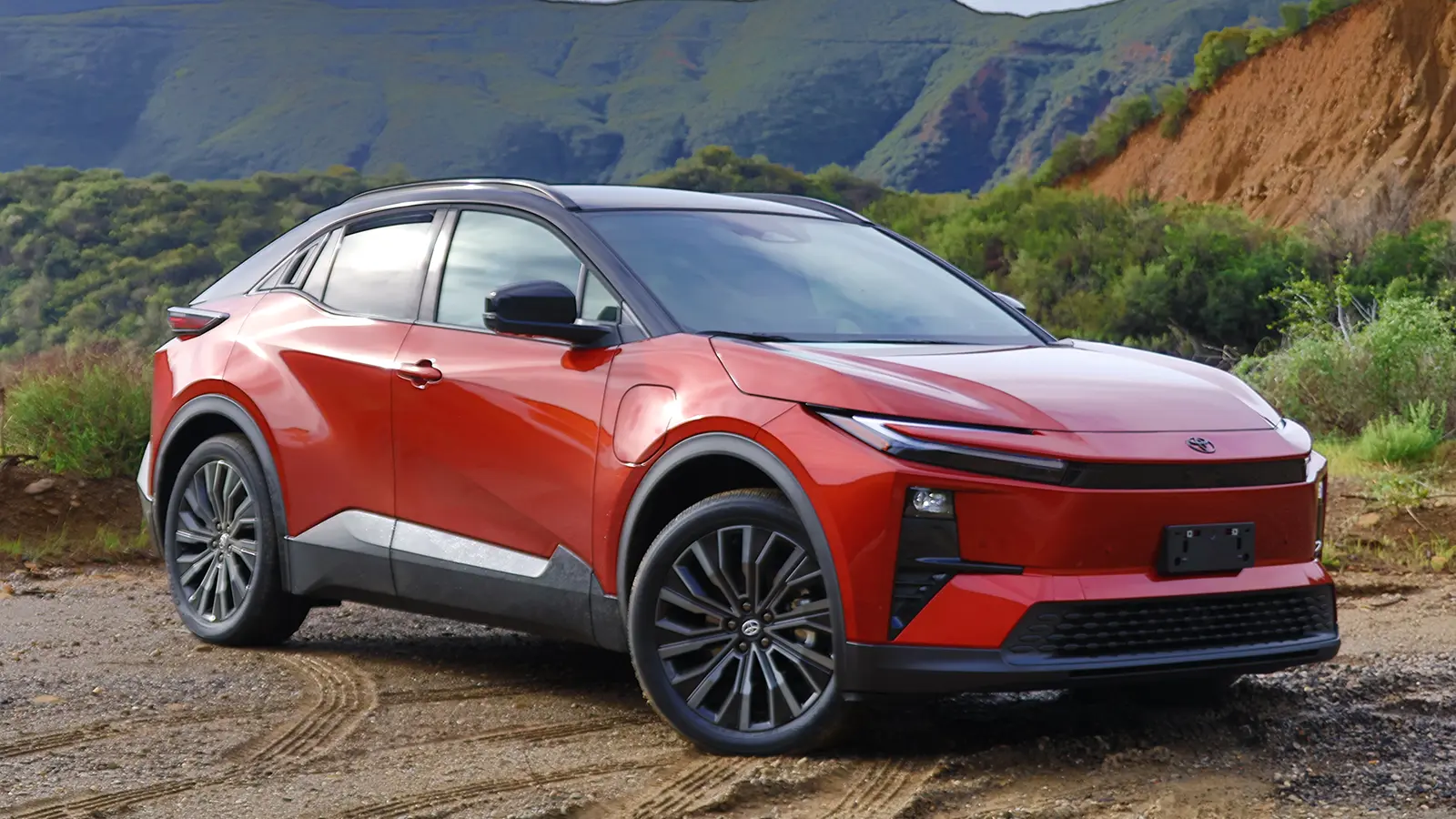 A red 2026 Toyota C-HR three quarter front view