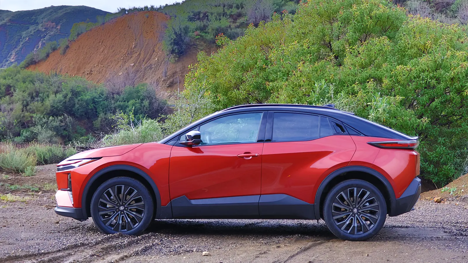 A red 2026 Toyota C-HR side view
