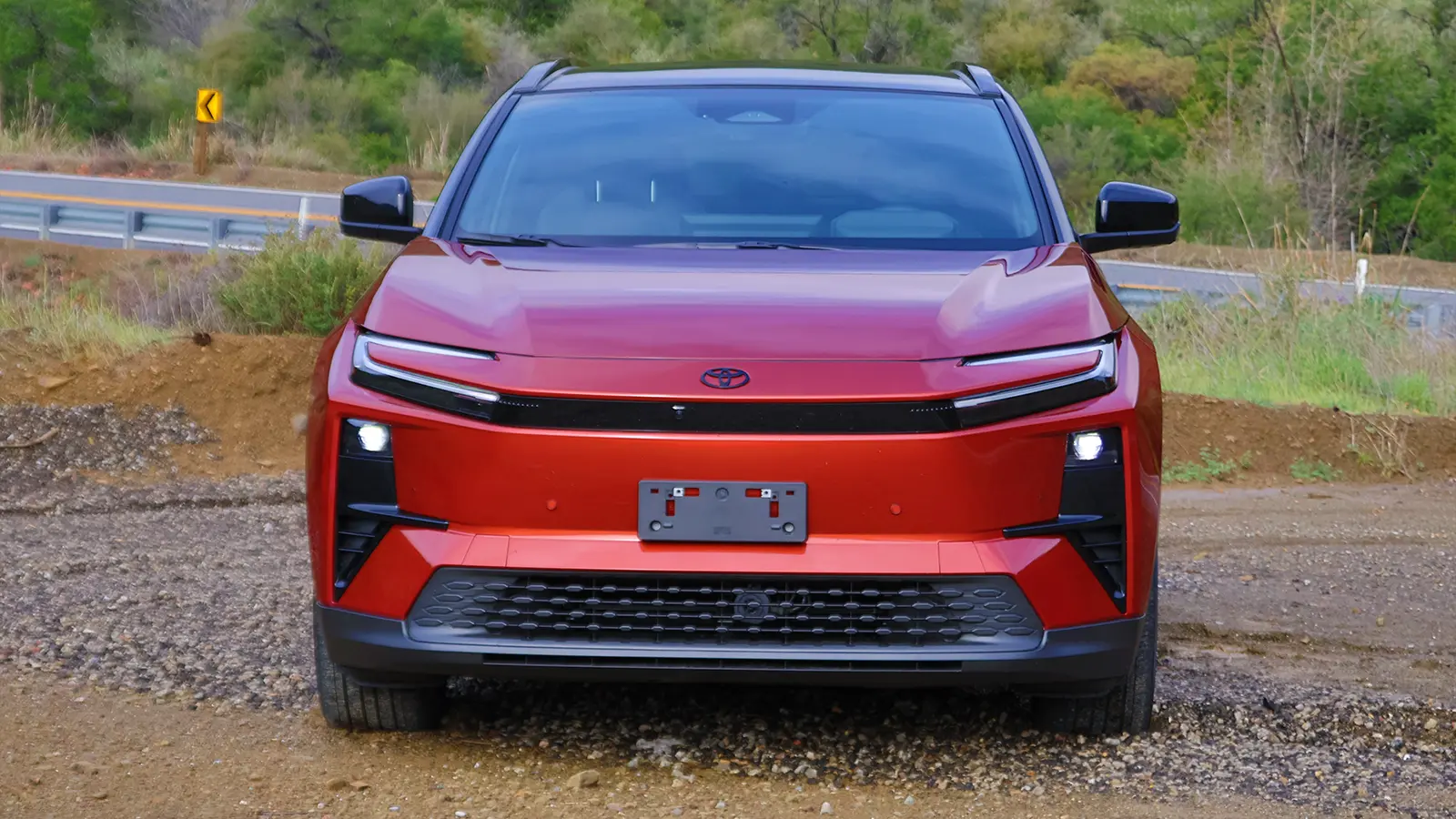 A red 2026 Toyota C-HR three quarter front view nose
