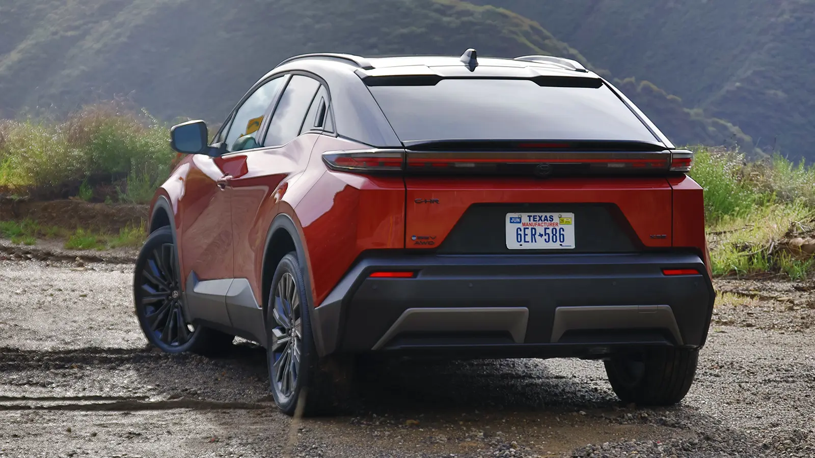 A red 2026 Toyota C-HR rear view