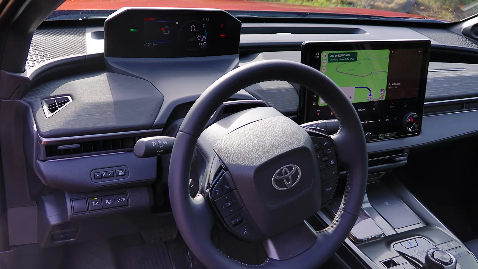 A red 2026 Toyota C-HR driver front view