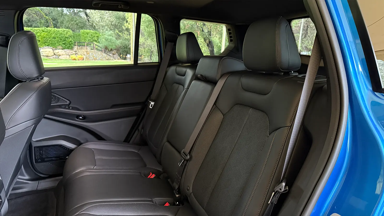 A blue 2026 Jeep Cherokee rear seat view