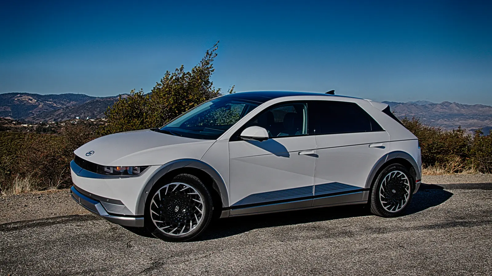 A white Hyundai Ioniq 5 three quarter front view