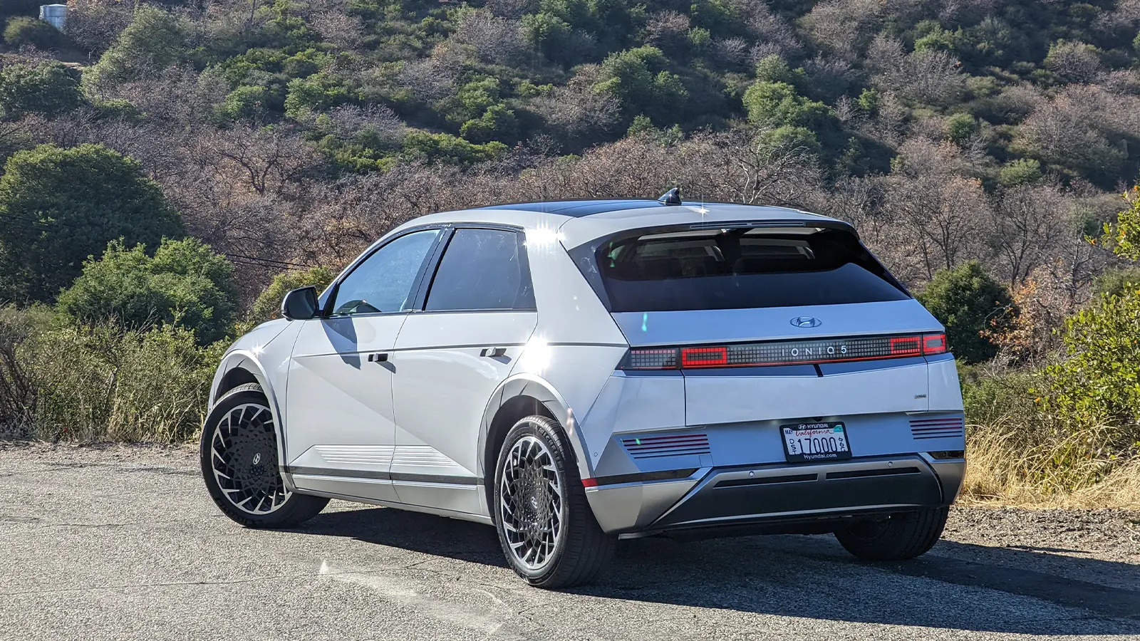 A white Hyundai Ioniq 5 three quarter rear view