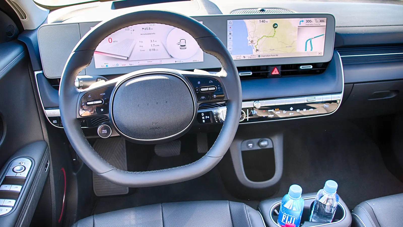 A white Hyundai Ioniq 5 driver front view