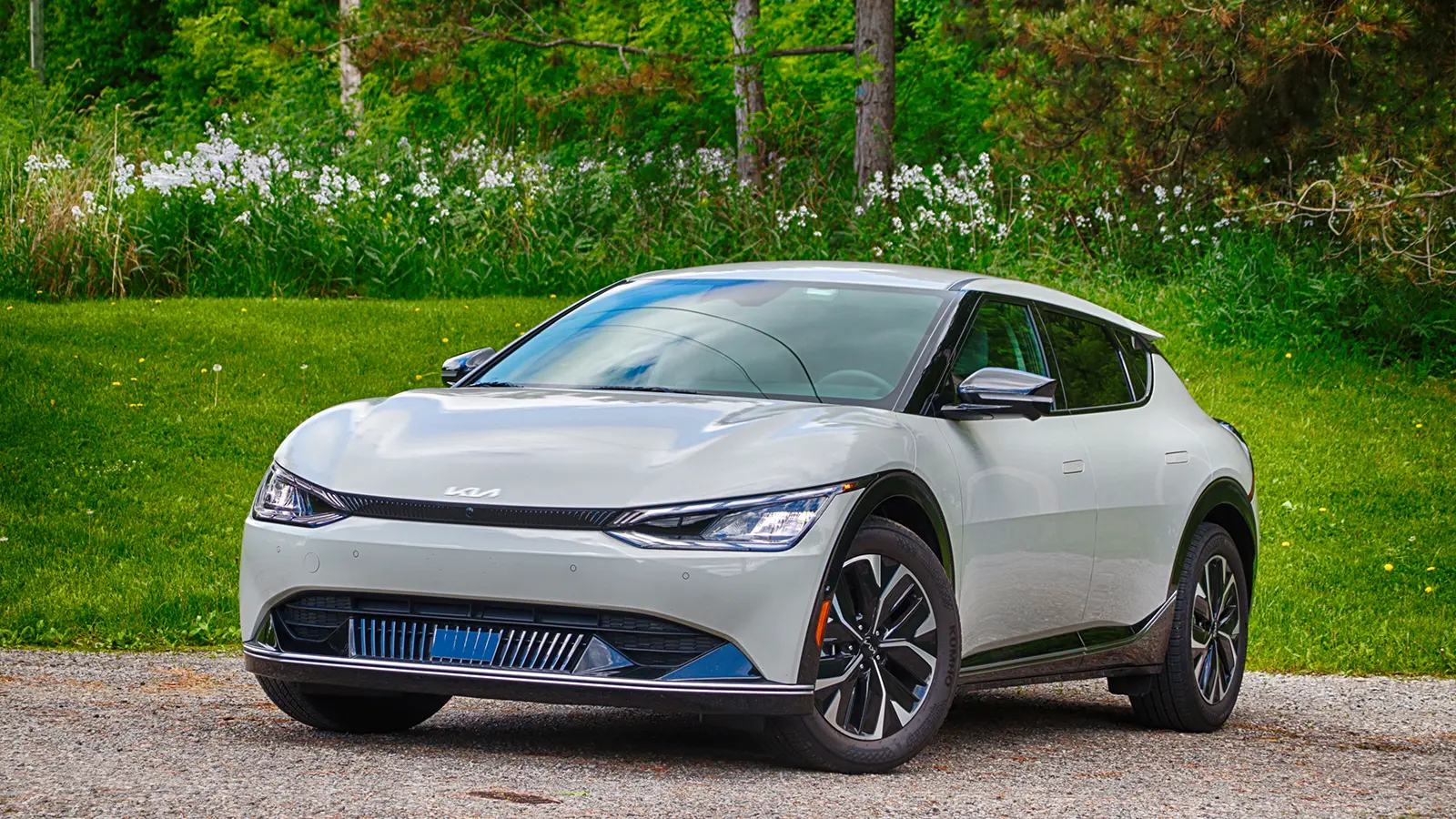 A white 2022 Kia EV6 Wind AWD three quarter front view
