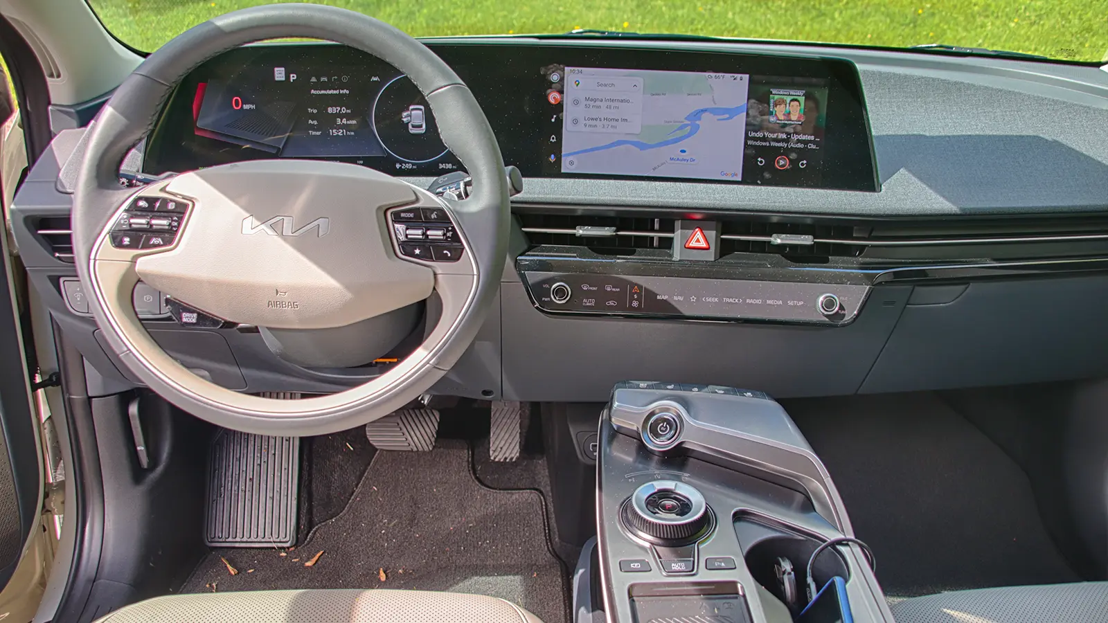 A white 2022 Kia EV6 Wind AWD driver interior front view