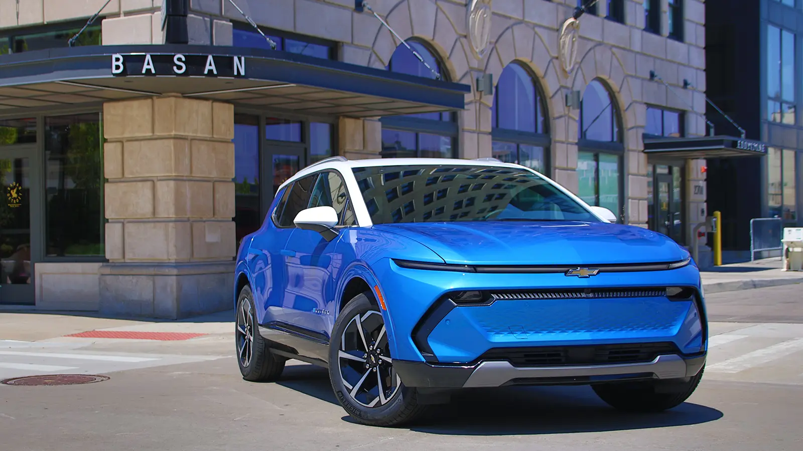 A blue Chevrolet equinox three quarter front view