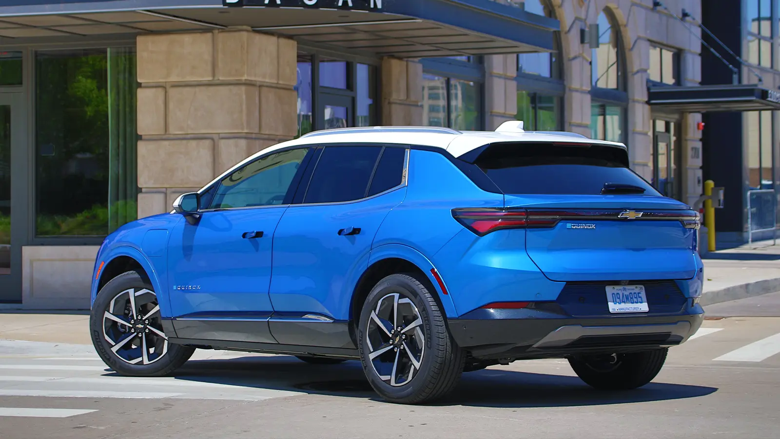 A blue Chevrolet equinox three quarter front view