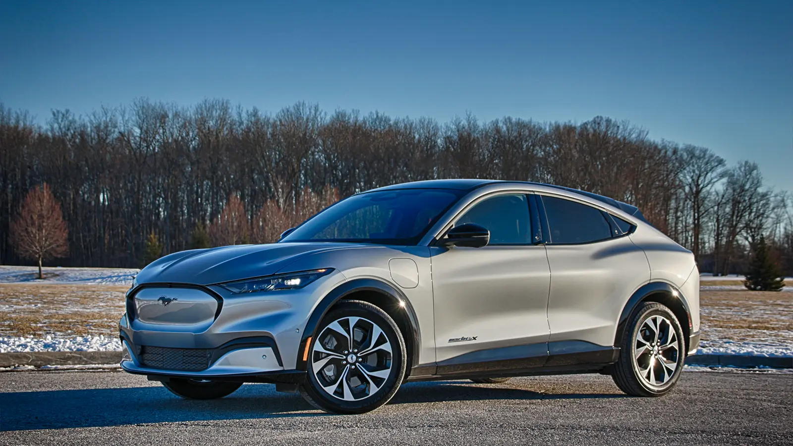 A silver Ford-Mustang Mach e three quarter front view