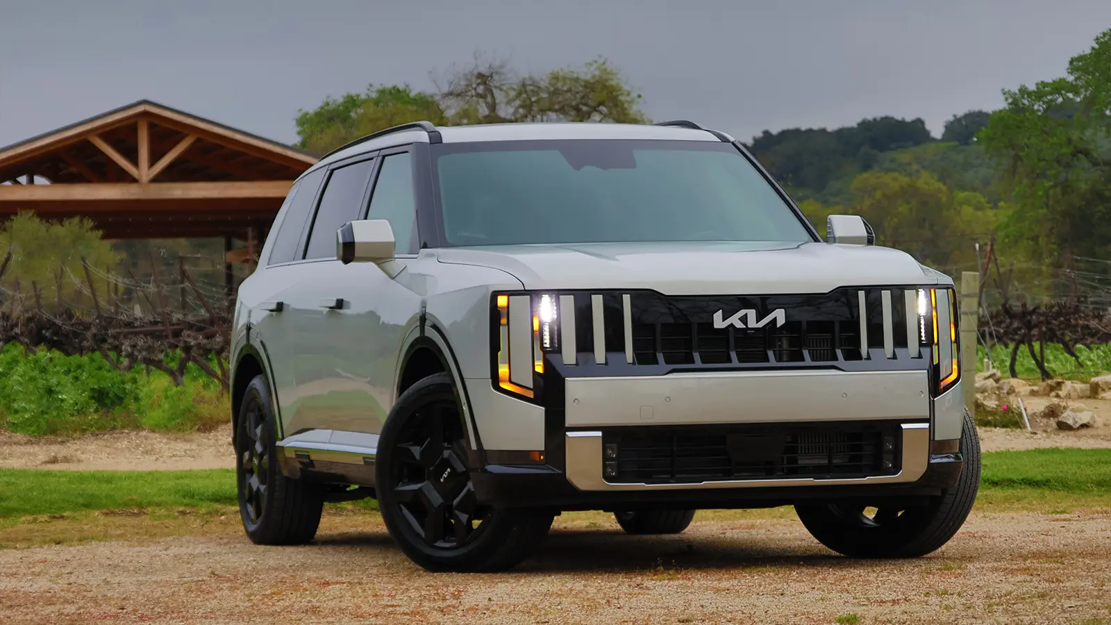 A 2027 Kia Telluride three quarter front view in a scenic area