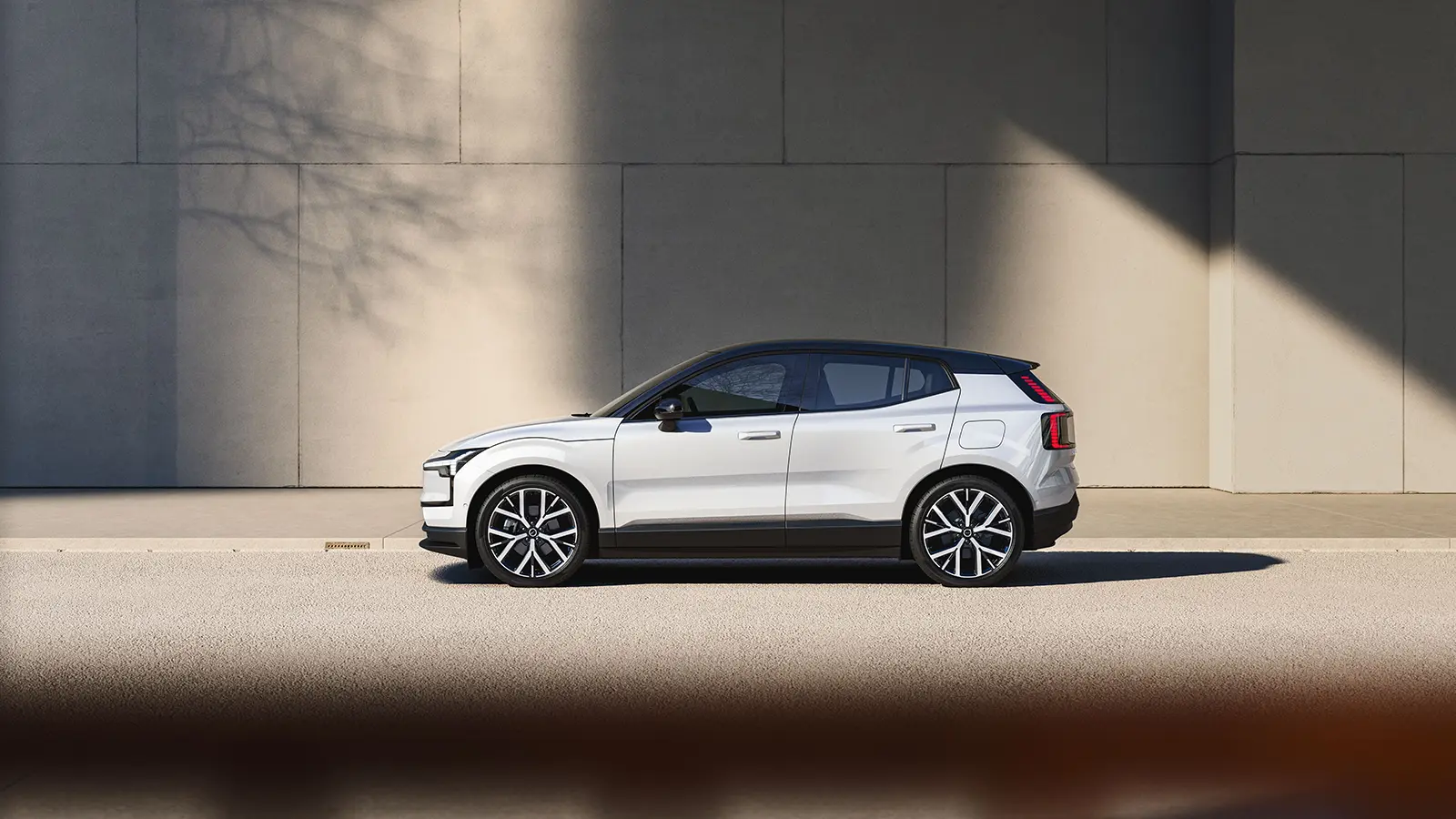 A white Volvo EX30 side view