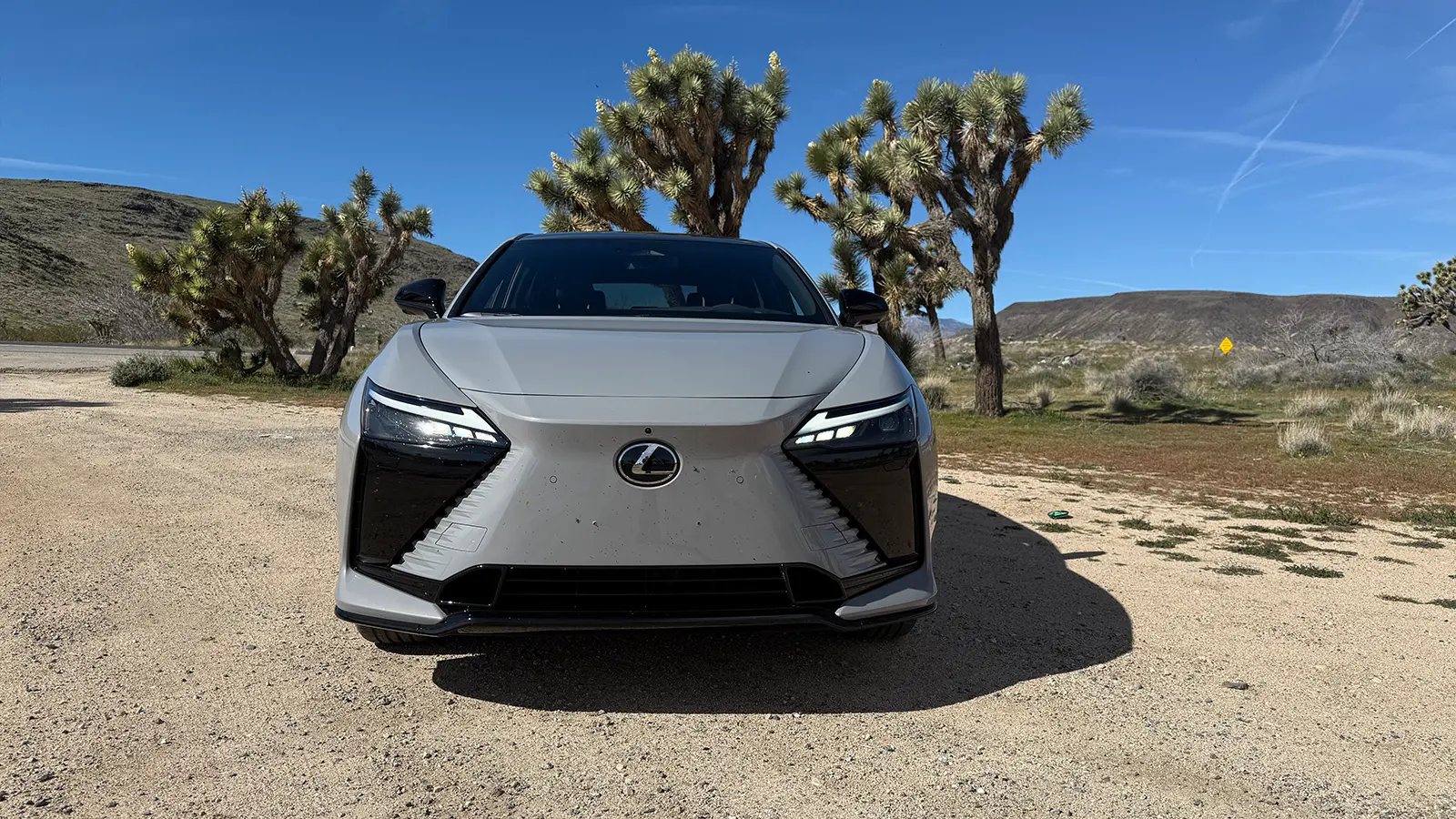 A gray 2026 Lexus RZ550e F Sport Review nose view