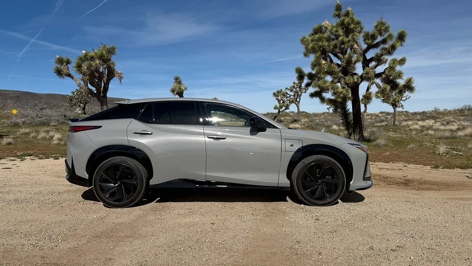 A gray 2026 Lexus RZ550e F Sport Review side view