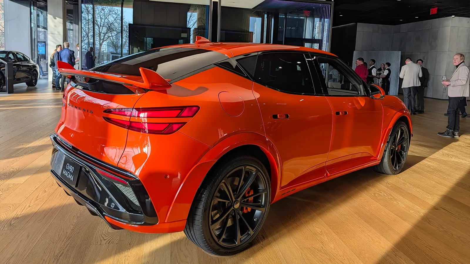 A Genesis GV60 three quarter rear view