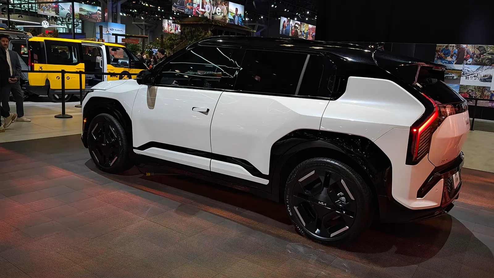 A white Kia EV3 side view