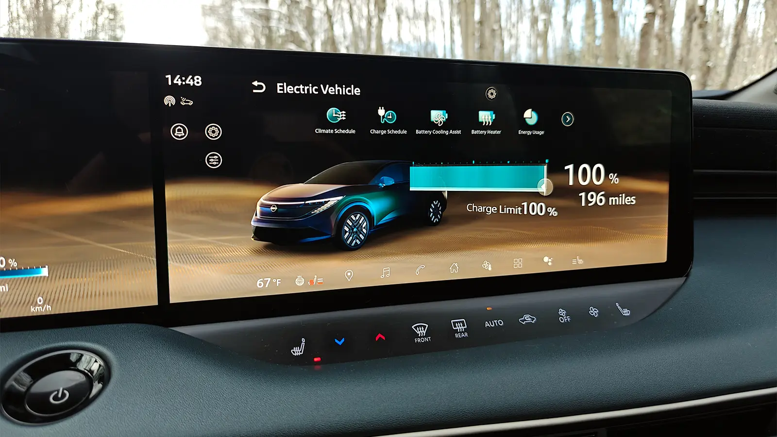 A teal 2026 Nissan Leaf driver HUD view