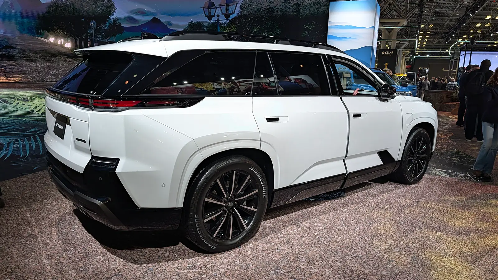A white 2027 Subaru Getaway side view from the 2026 NY Auto Show