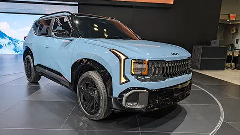 A light blue 2027 Kia Seltos three quarter front view at thh 2026 NY Auto Show