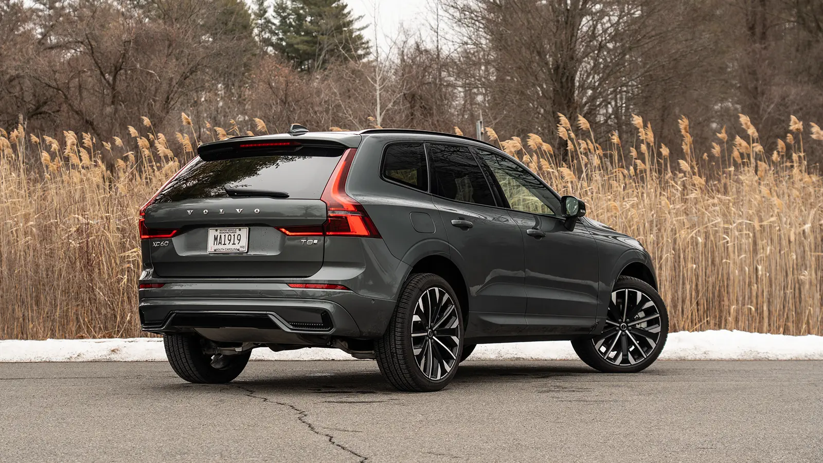 A black 2026 Volvo XC60 T8 three quarter rear view