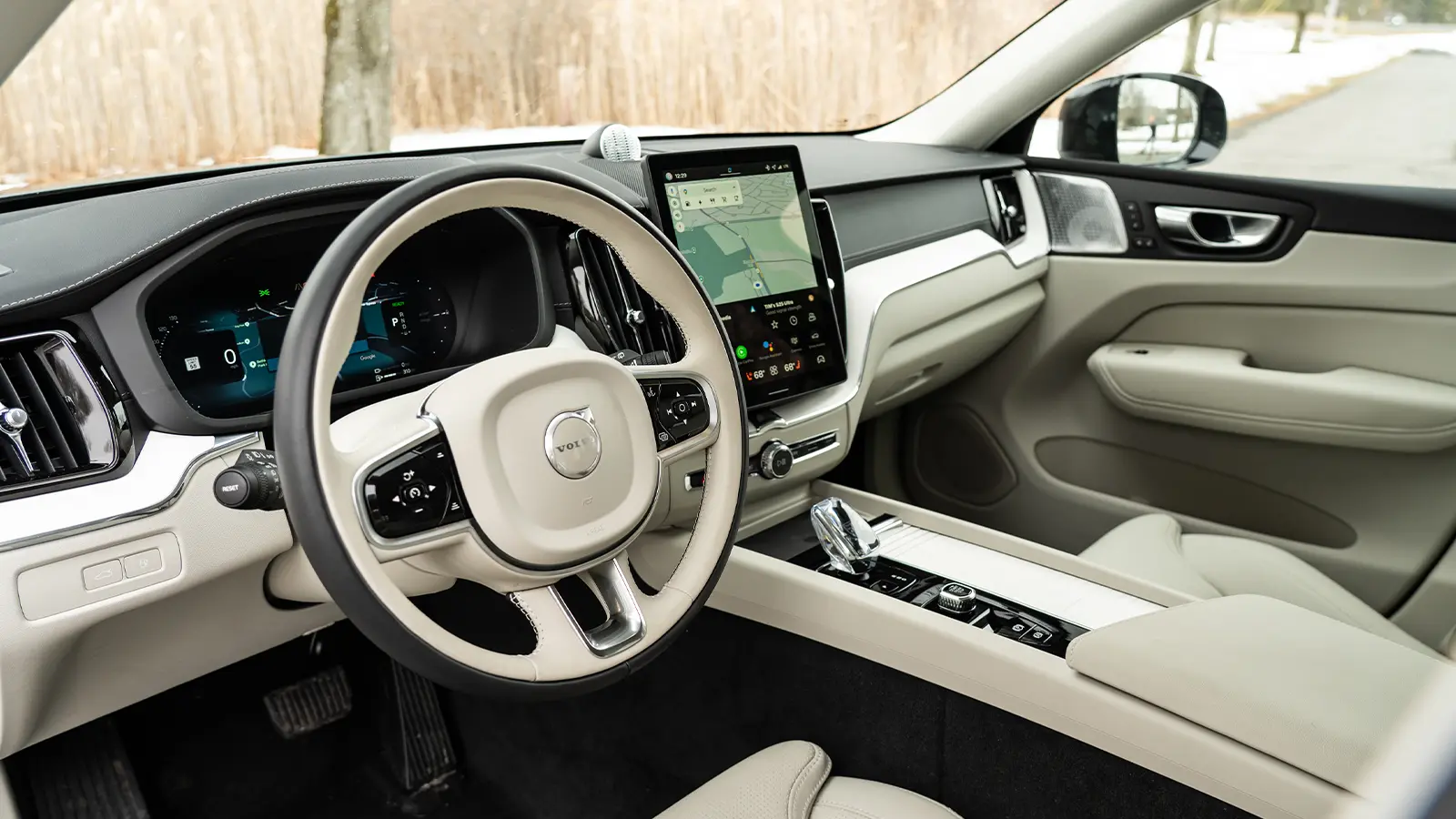 A 2026 Volvo XC60 T8 front interior driver side view