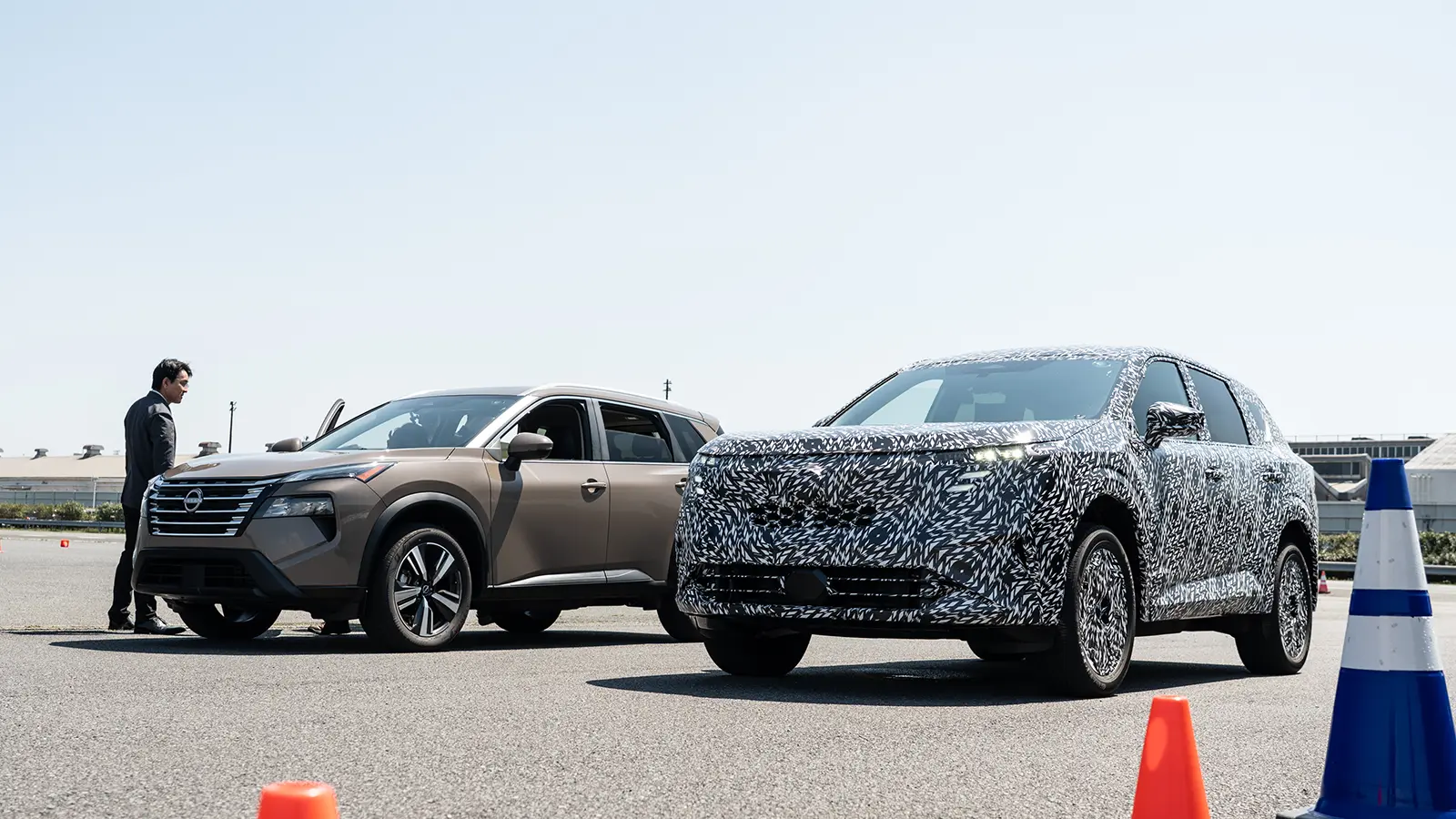 A 2027 Rogue e Power Prototype First Drive actual three quarter front view side by side