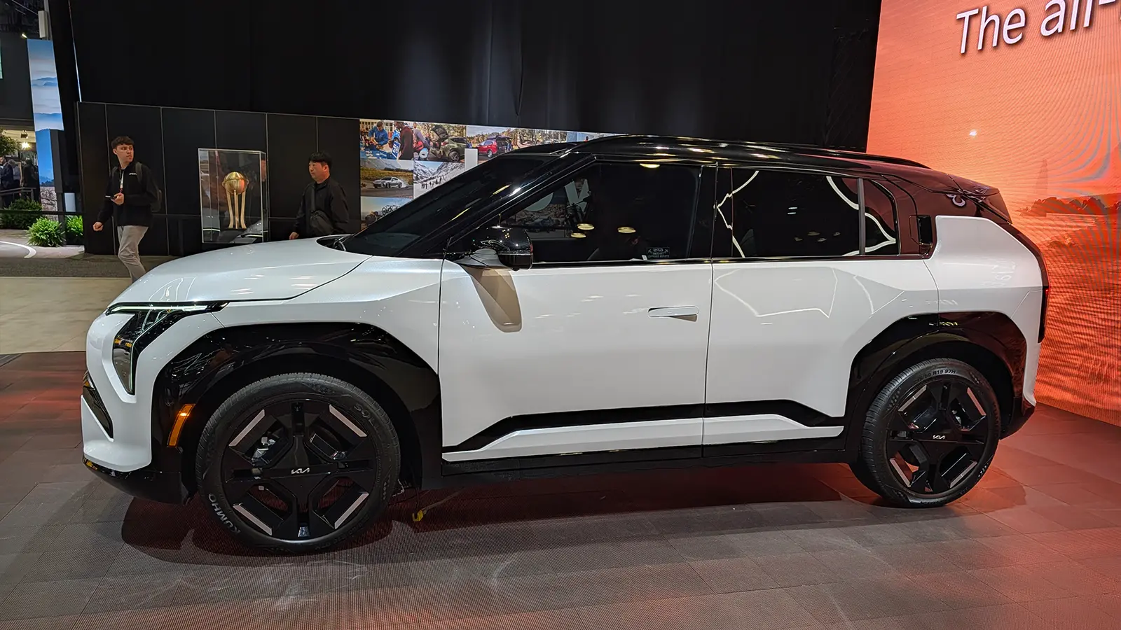 A white 2027 Kia EV3 side view