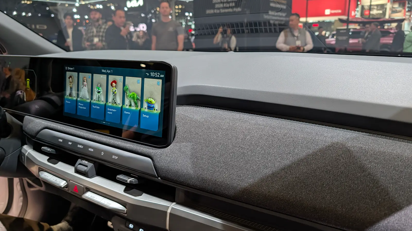 A white 2027 Kia EV3 interior driver HUD close-up of screen view