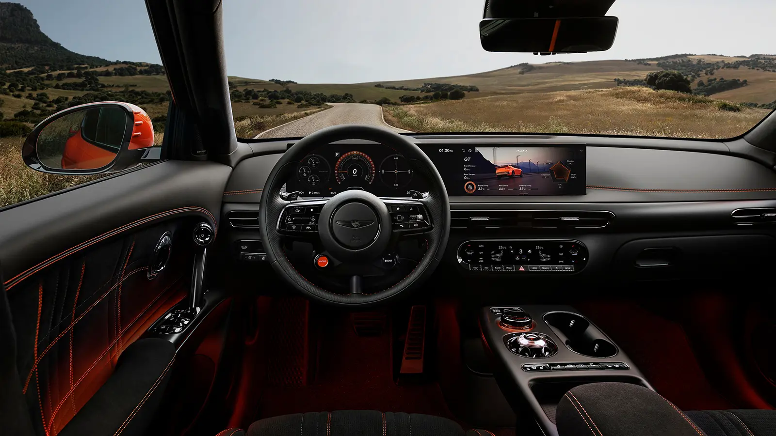A 2027 Orange Genesis GV60 Magma driver interior front view