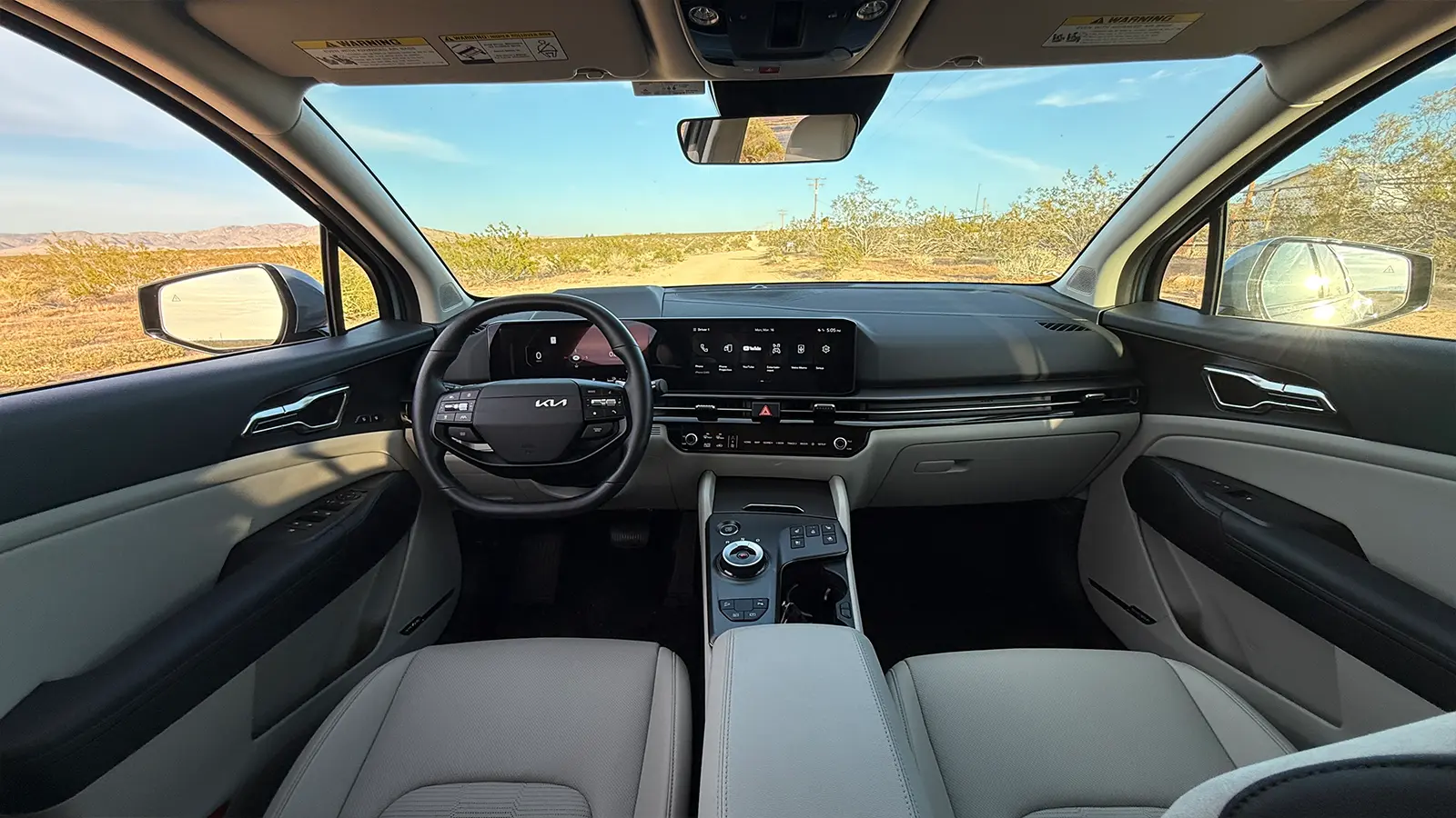 A 2026 Kia Sportage interior driver front view