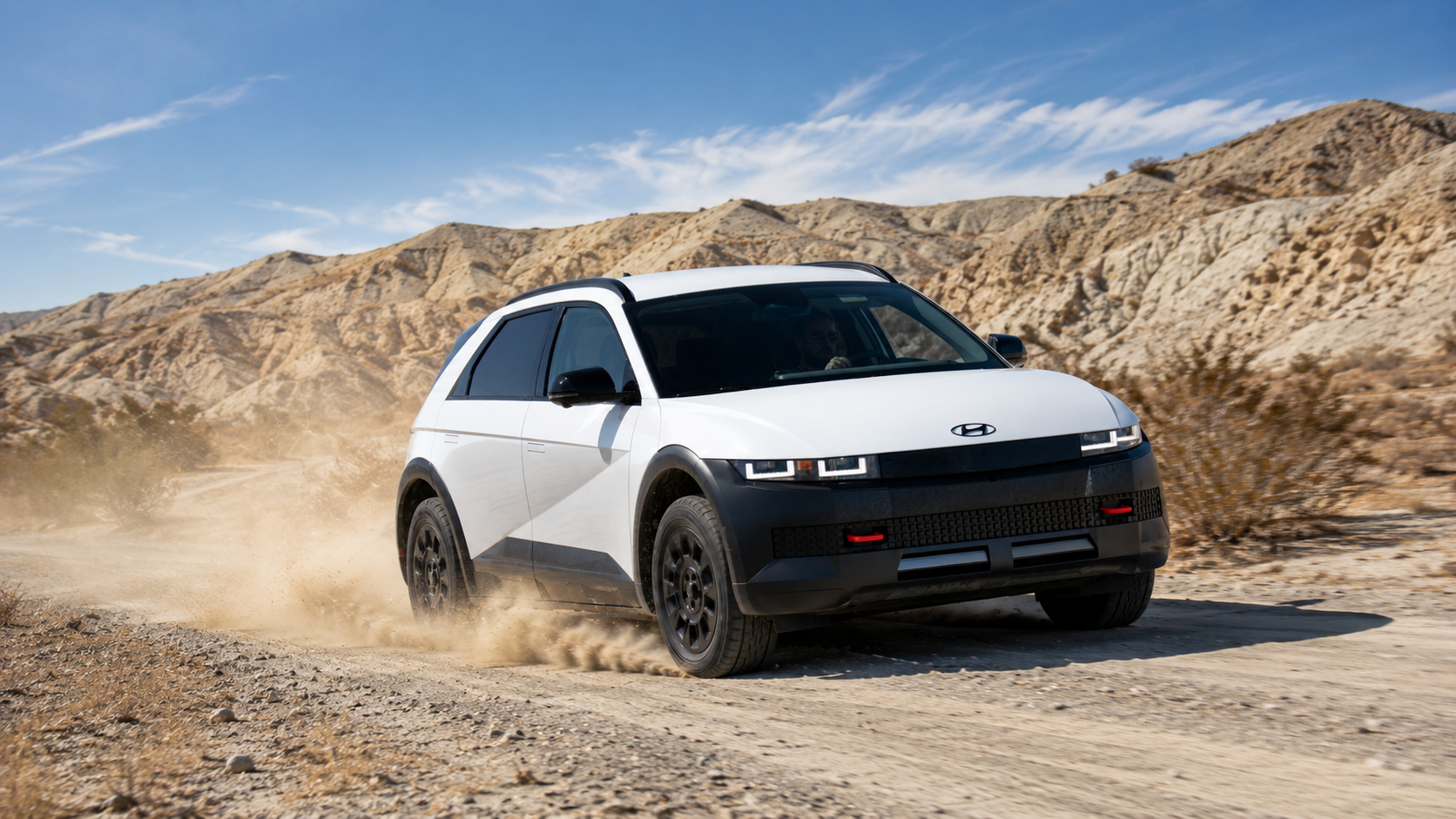 A white 2025 Hyundai Ionique 5 in a desert