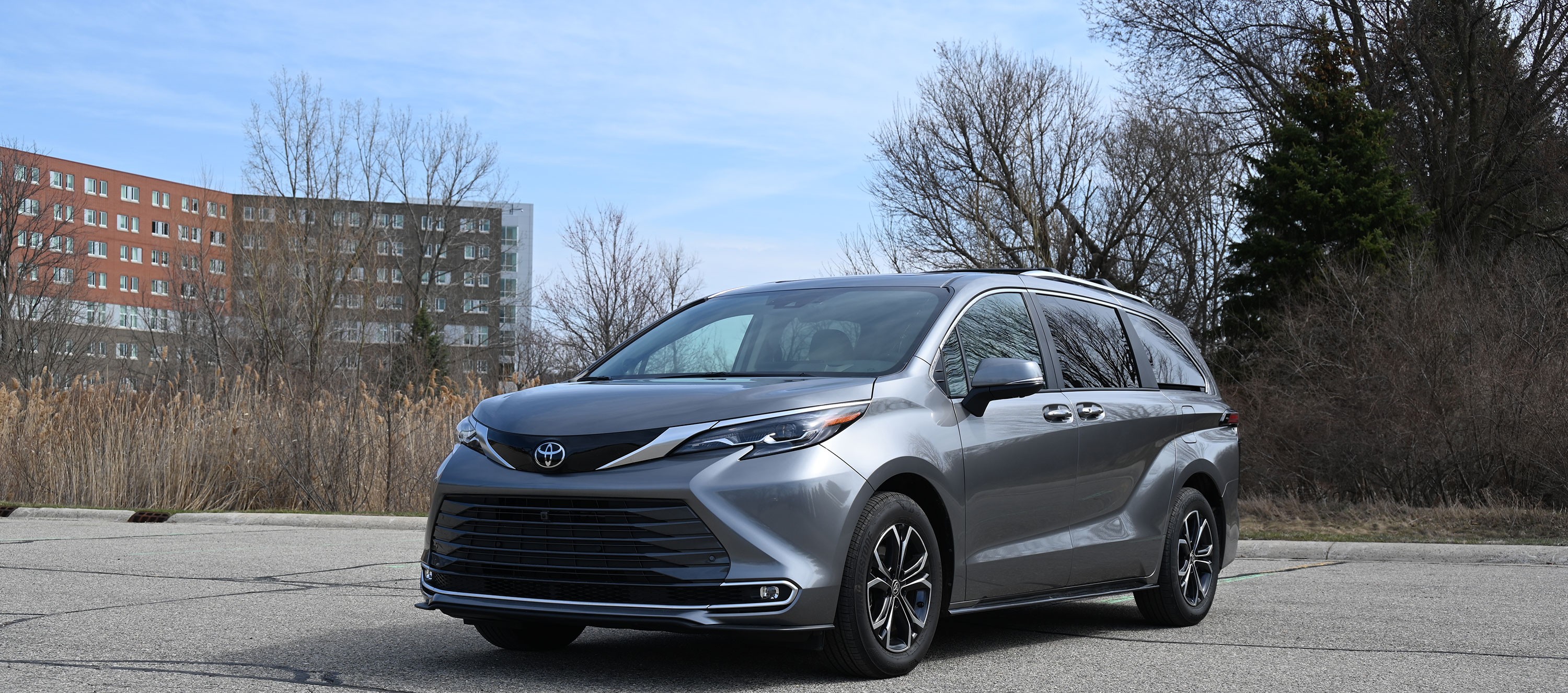 2026 Toyota Sienna Hybrid parked nest to a building