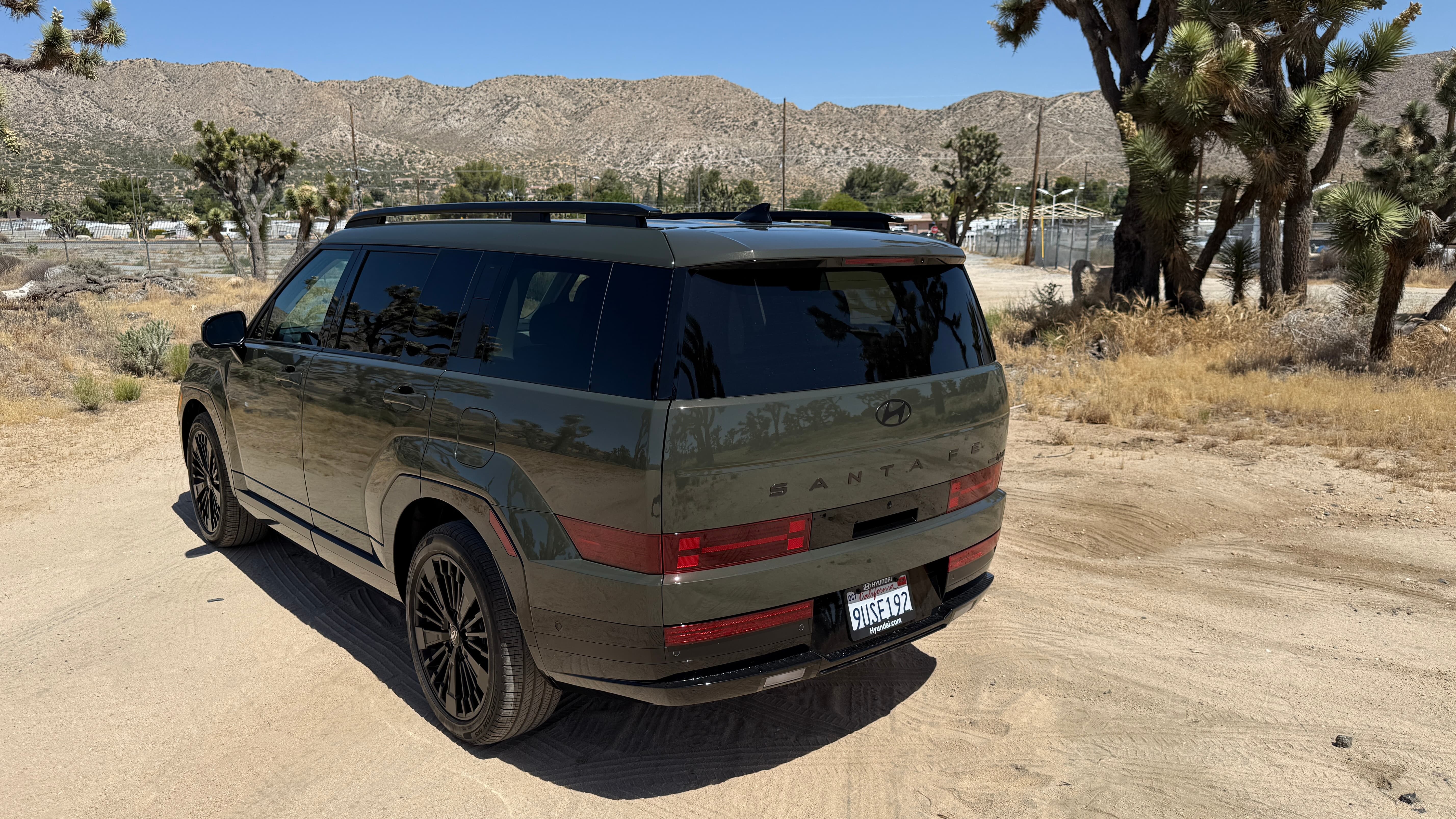 2026 Hyundai Santa Fe Hybrid back view standing in the desert