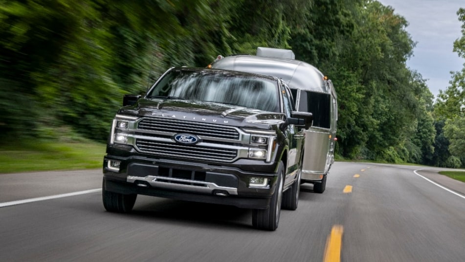 Ford F-150 Hybrid on the highway with an airstream