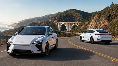 2026 Lexus ES350h Ultra White Front and Rear Exterior view standing on a highway
