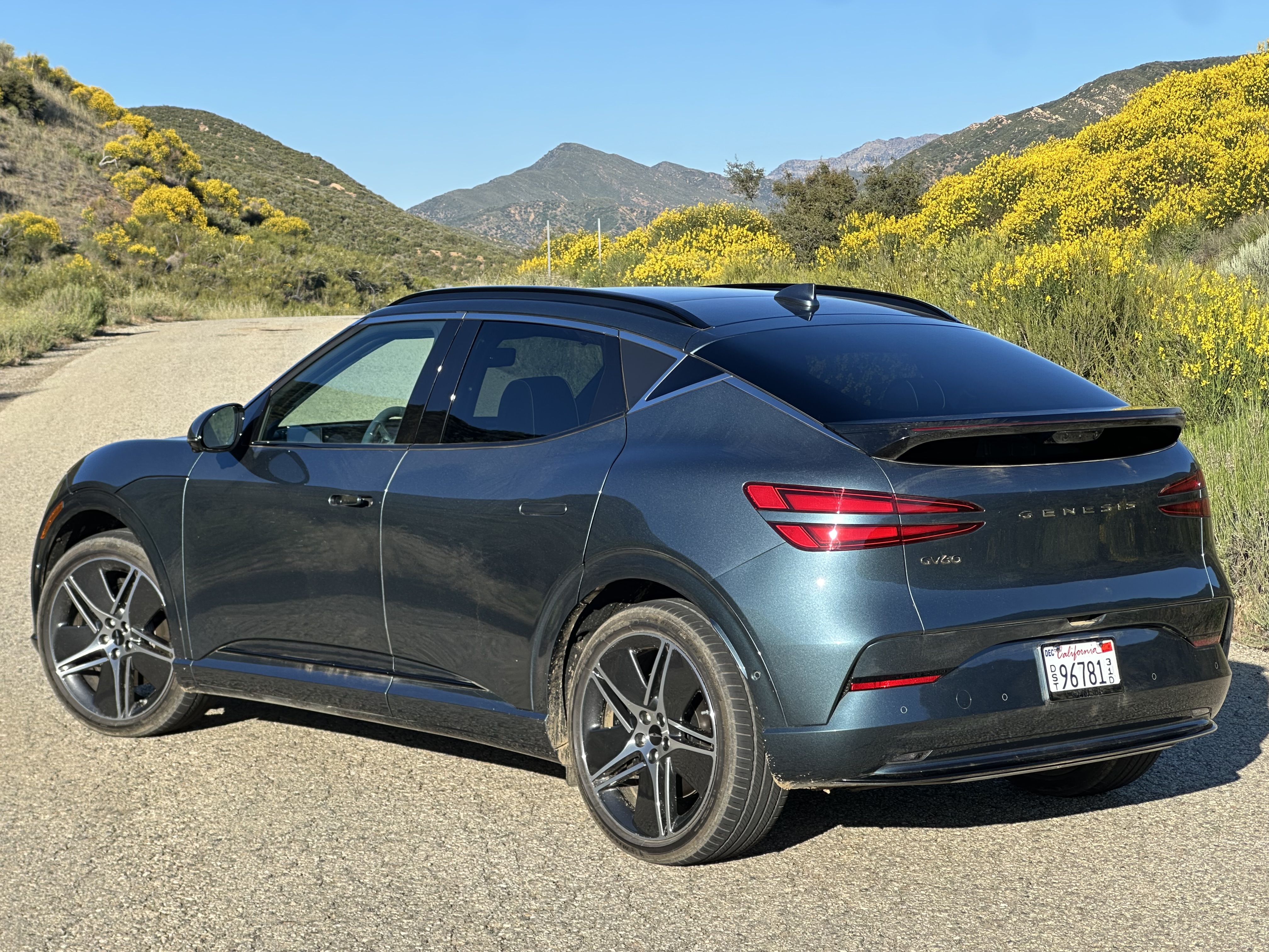 Genesis GV60 three quarter rear view outdoors