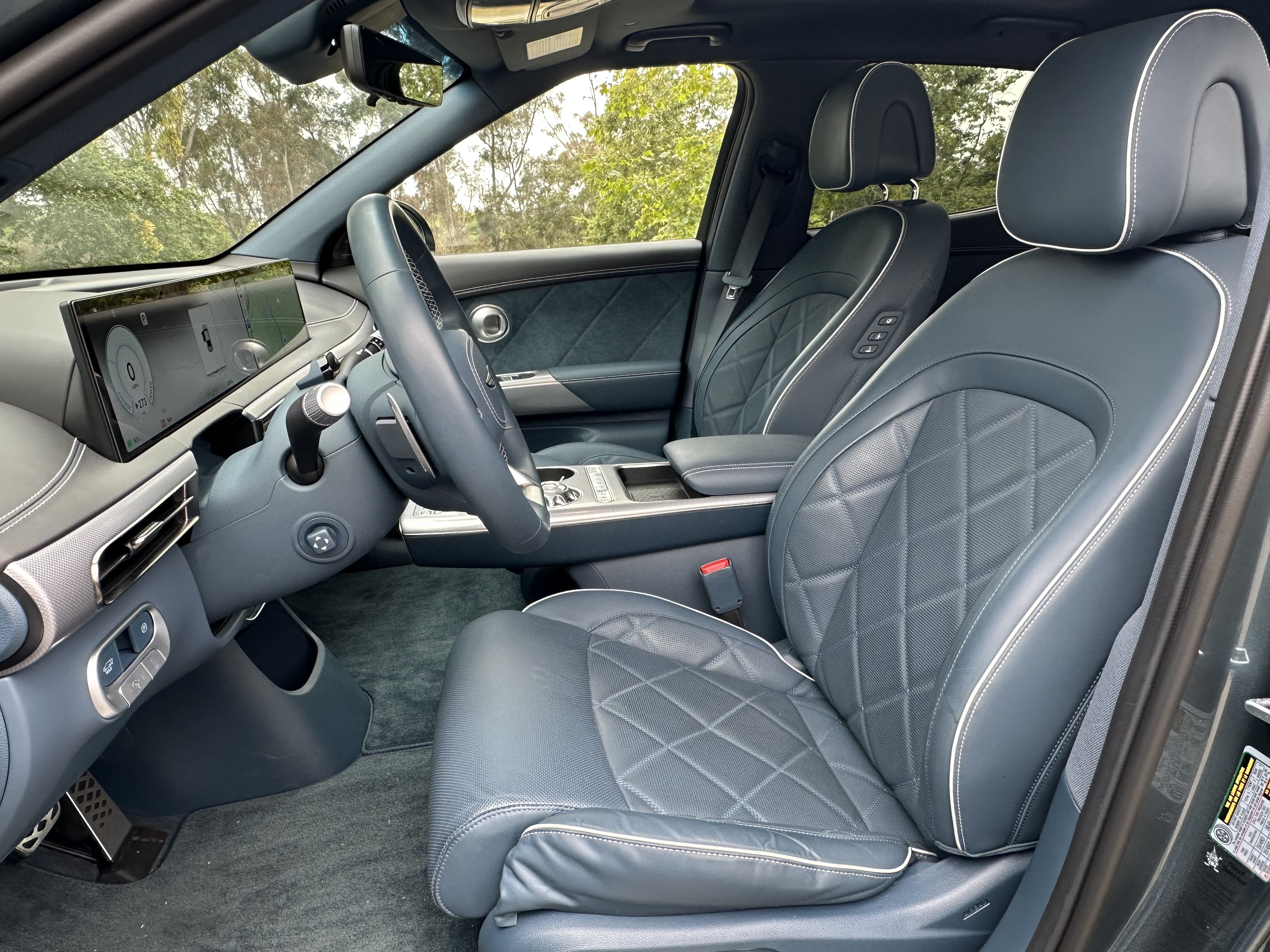 Genesis GV60 front seat black leather interiors