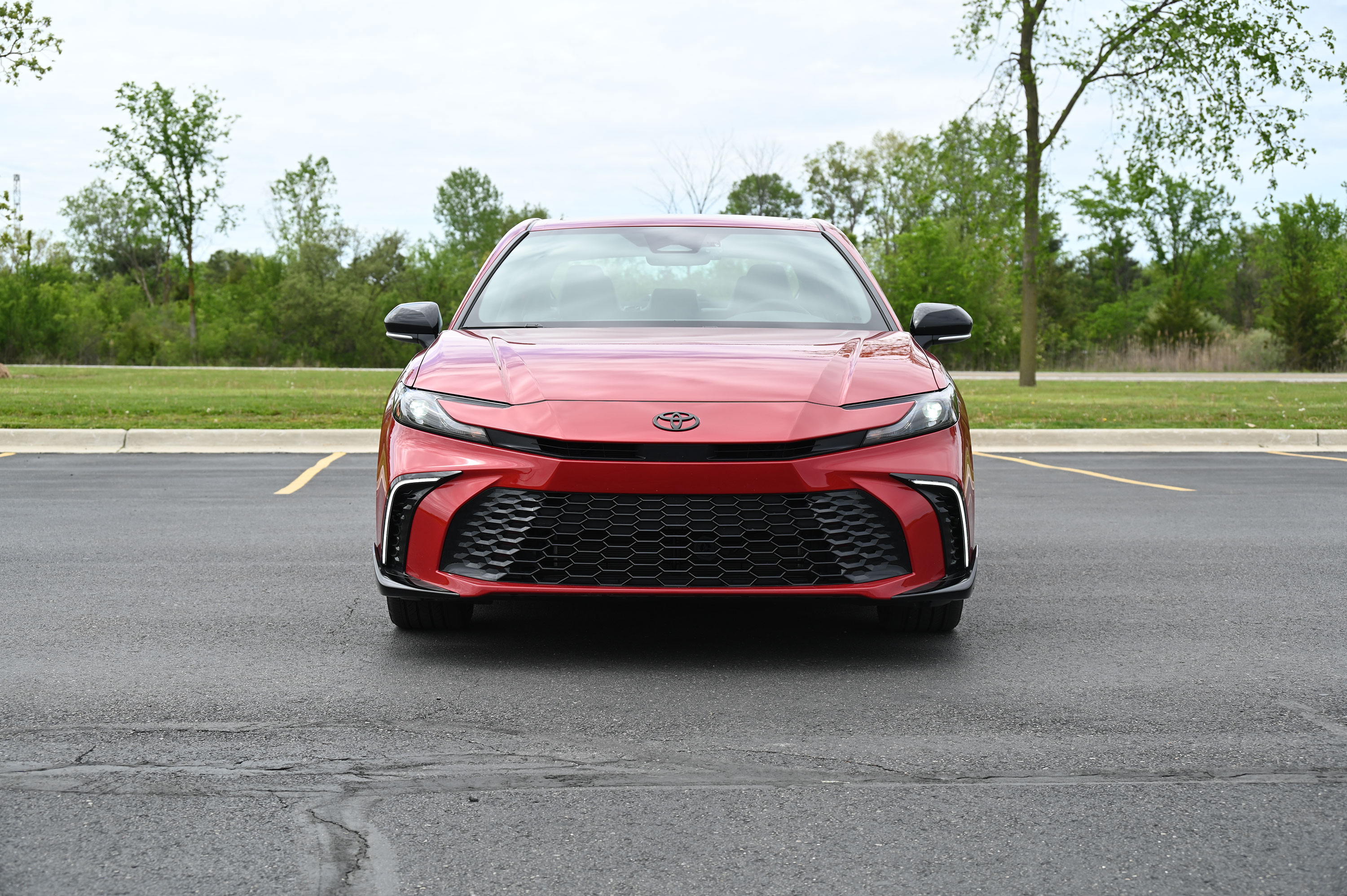 2026 Red Toyota Camry Nightshade Front Angle standing in a parking lot