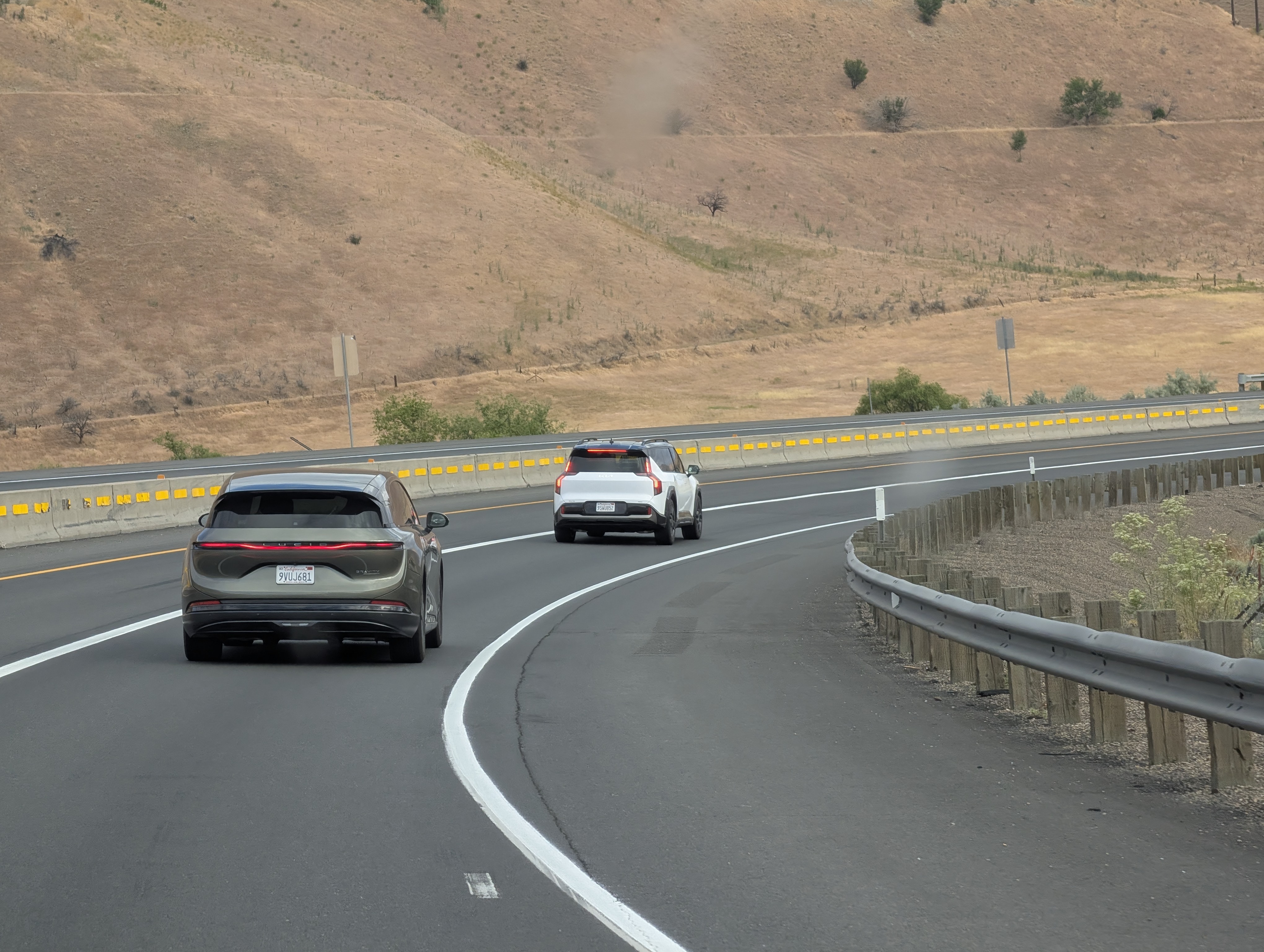 Kia and Lucid on the highway