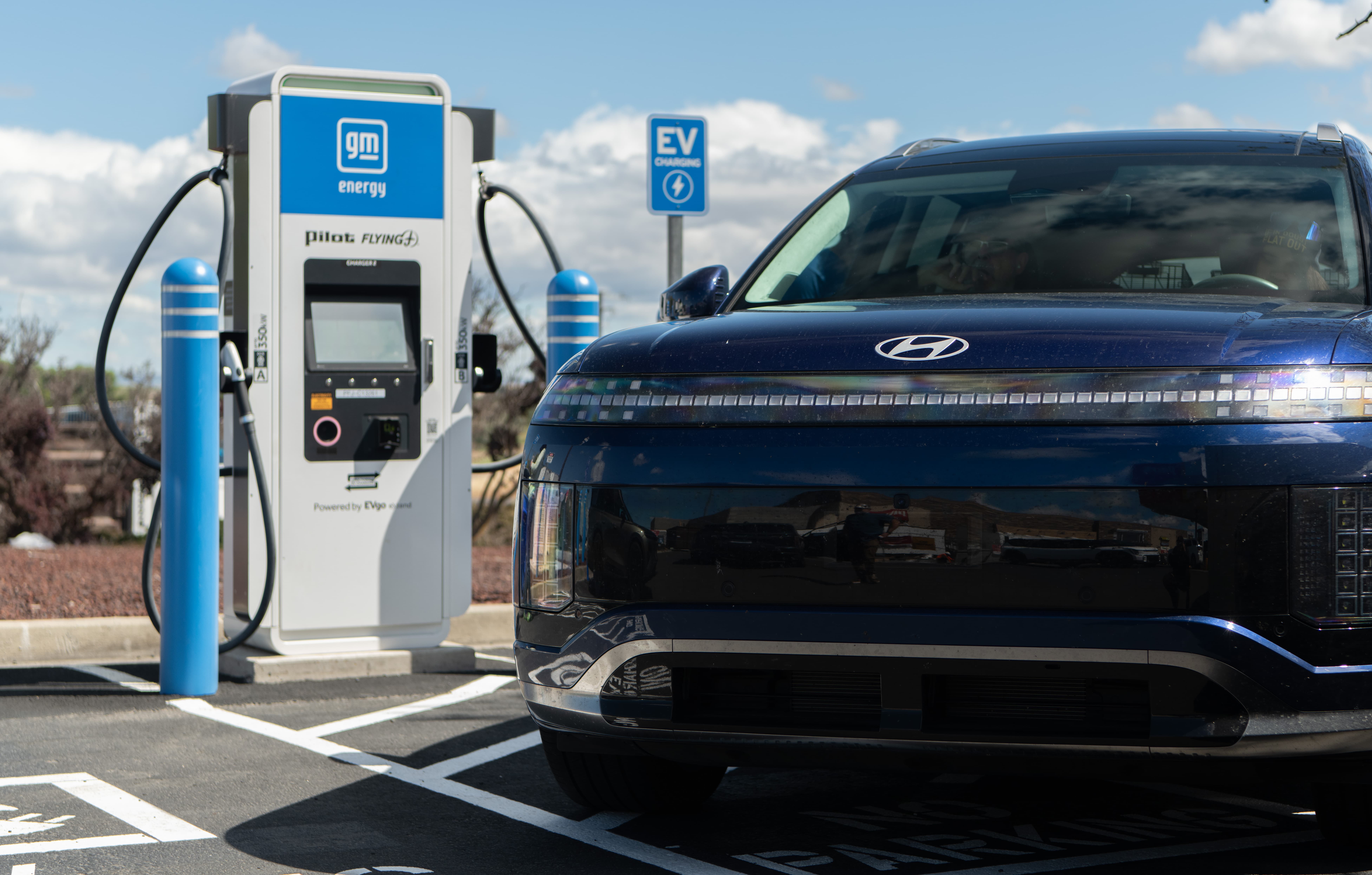 A blue Hyundai Ioniq 9 getting charged