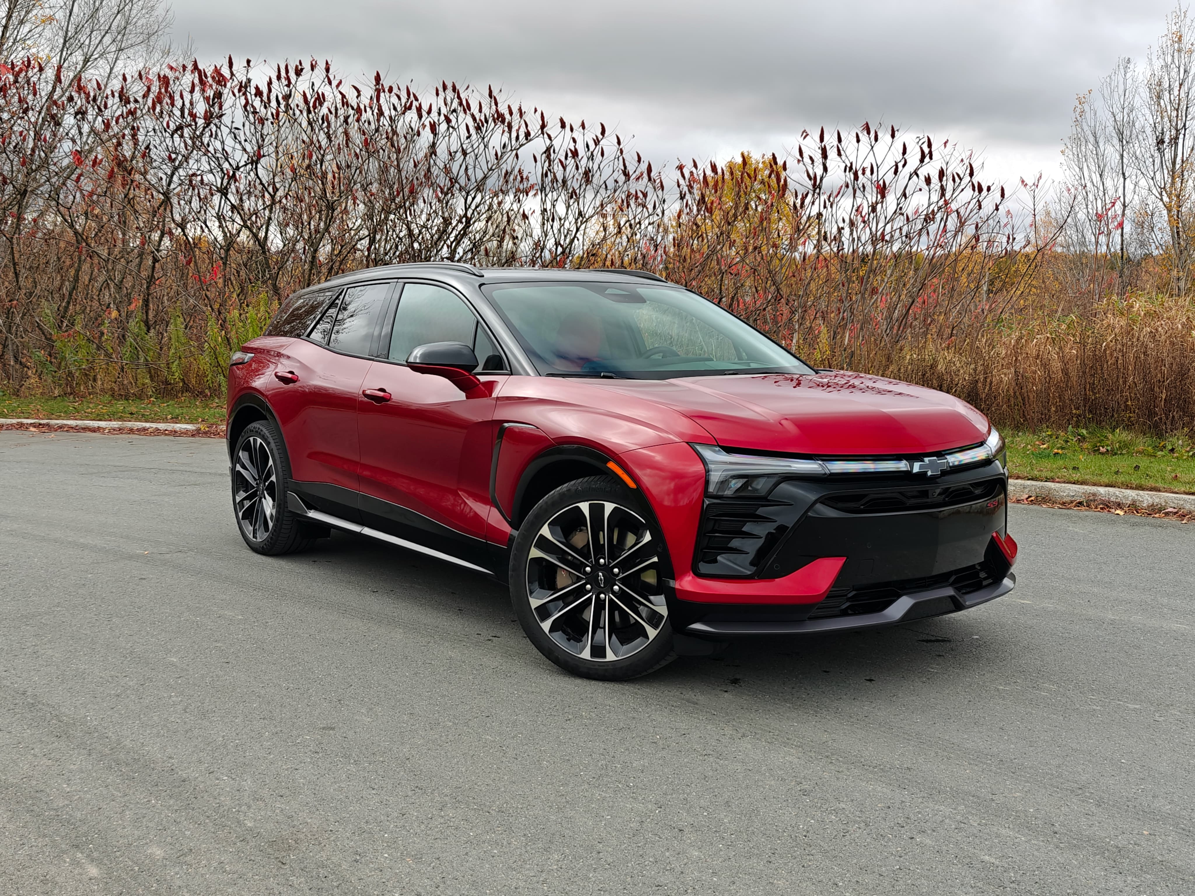 A Red 2026 Chevrolet Blazer EV standing outside