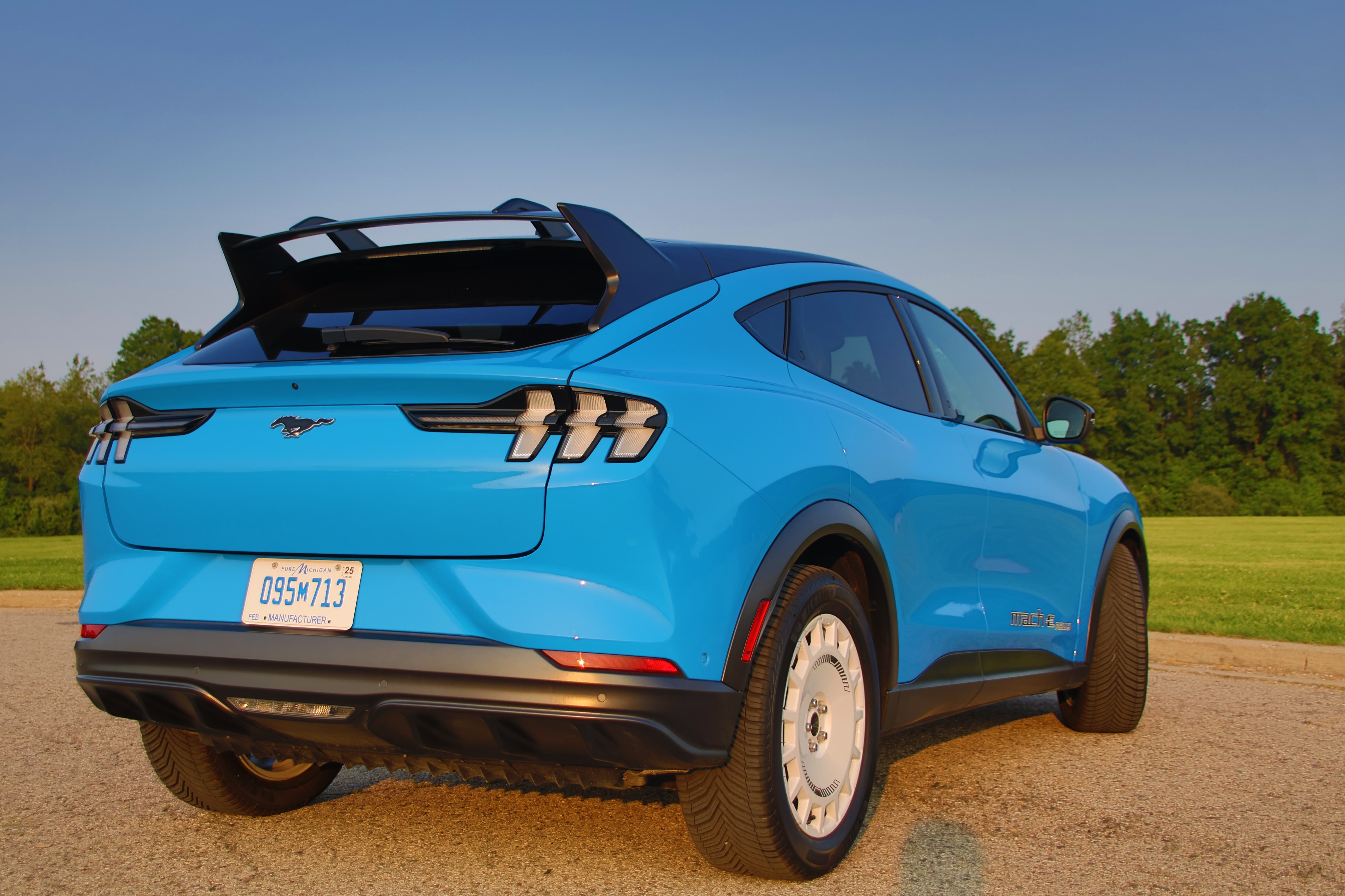 A blue 2026 Ford Mustang Mach-E rear view