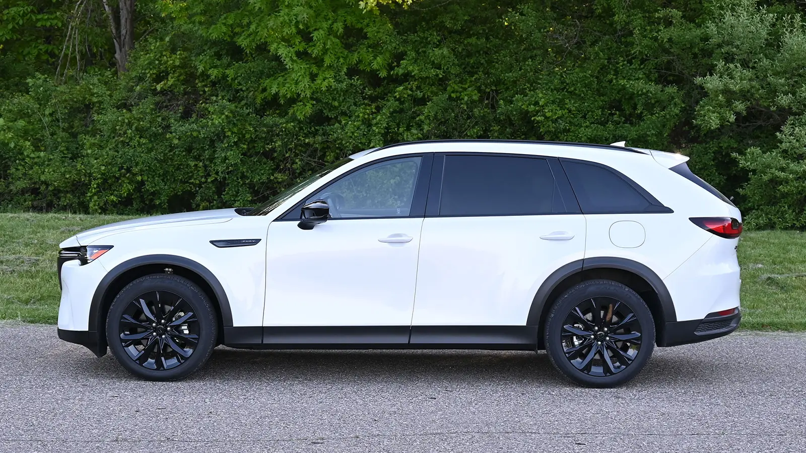 A White Mazda-CX-90 2026 side view in a parking lot
