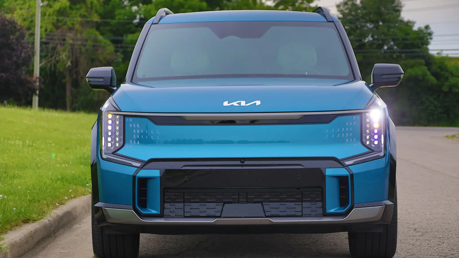 A blue 2026 Kia EV9 GT Line front nose view
