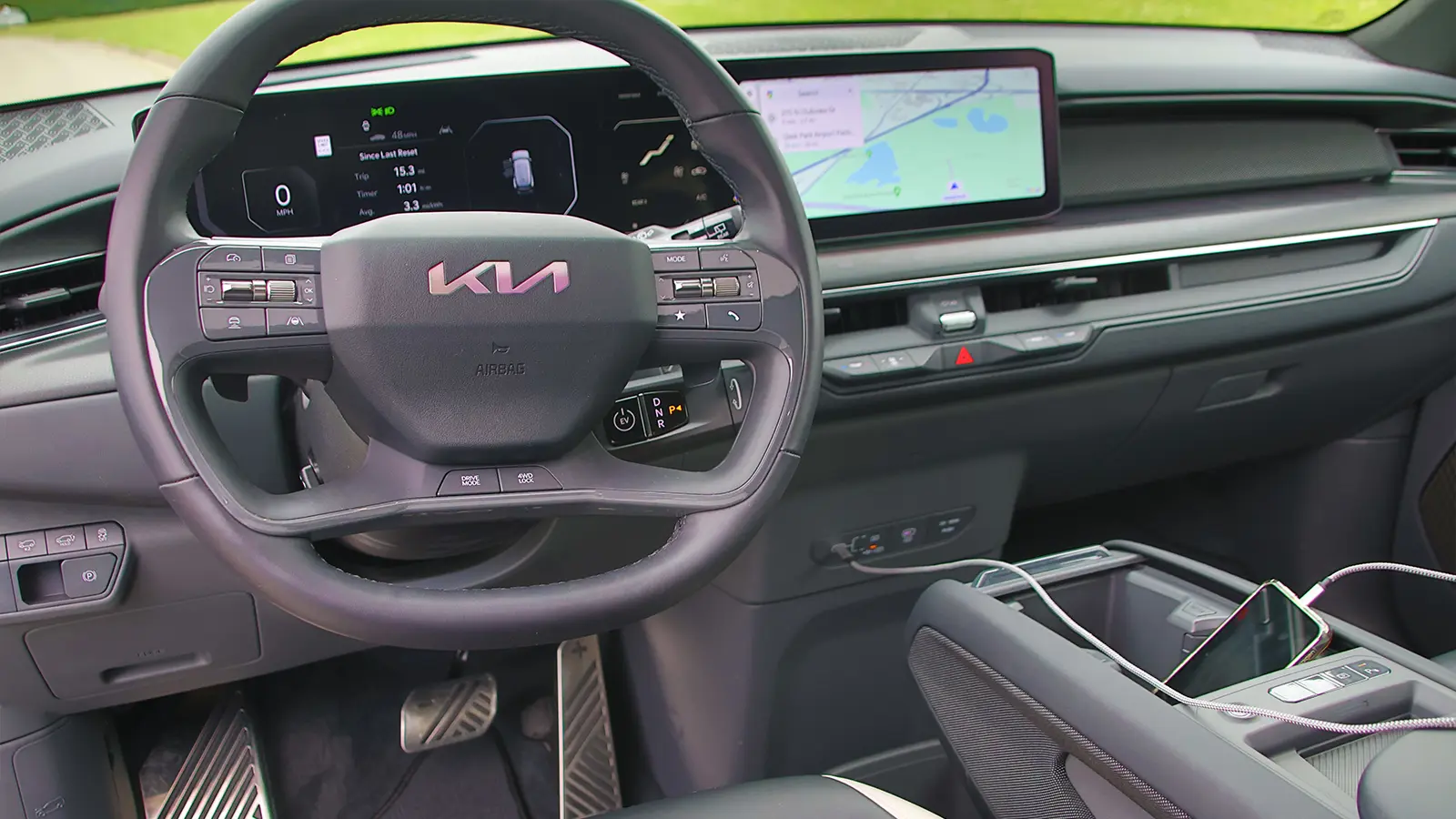 A blue 2026 Kia EV9 GT Line interior front view