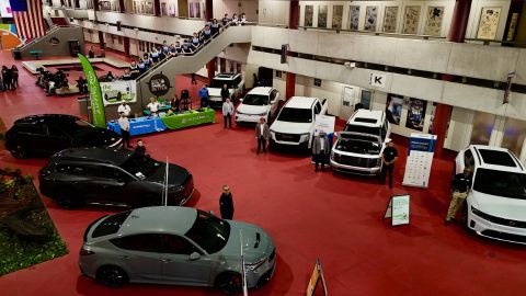 Hybrid and electric vehicles parked across the inside corridor of the Robert Morgan Educational Center and Technical College