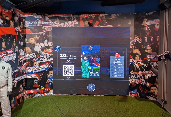 PSG Striker Game on a large LED wall in the Paris flagship store with leaderboard